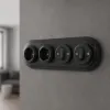 Négyes fekete porcelán keret süllyesztett kapcsolókhoz